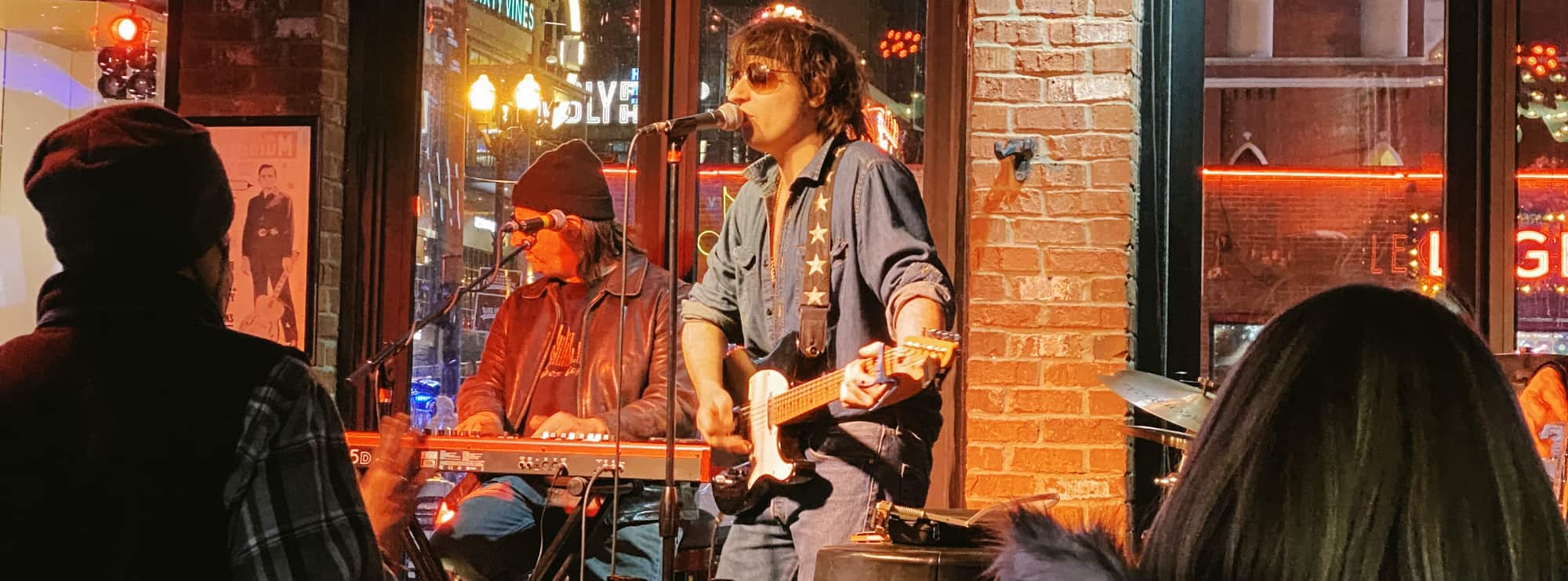 bar singer on guitar in Manhattan